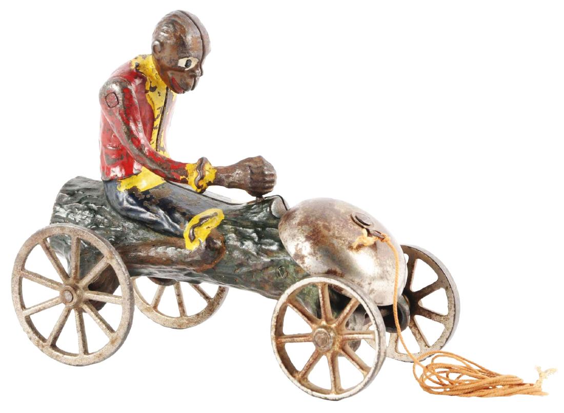 Monkey & Coconut Cast Iron Bell Toy. (1 of 2)