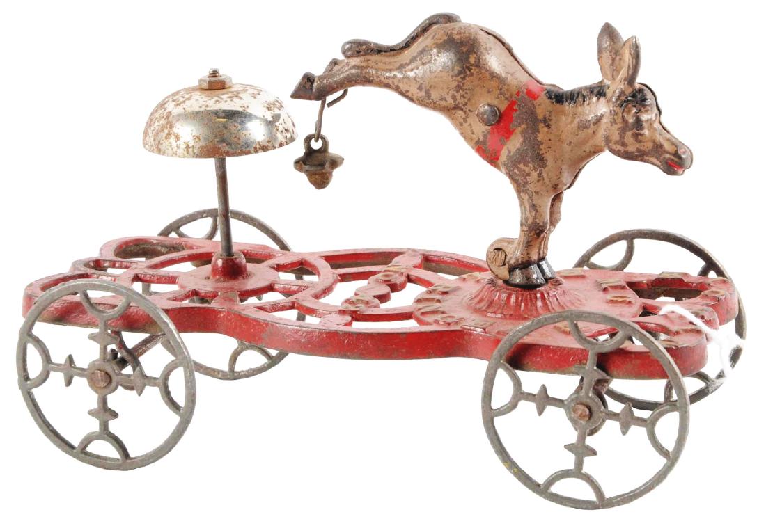 Kicking Mule Cast Iron Bell Toy. (1 of 2)