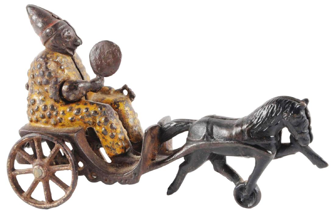 Cast Iron Fanning Clown Pull Toy. (1 of 2)
