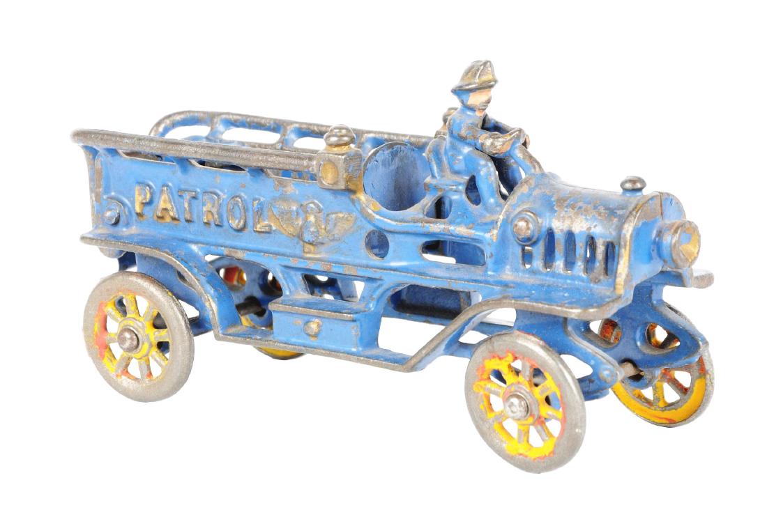 Cast Iron Patrol Truck.: Cast in driver. Missing figures in back. (JY).Condition:(Very Good).Dimensions:7 -1/4" x 2 -1/2".