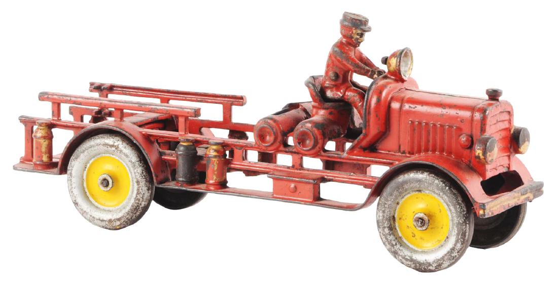Hubley Ladder Truck.: Missing uprights and ladders. Original Hubley figure but this figure is for a horse drawn toy. (JY).Condition:(Very Good).Dimensions:13" x 6".