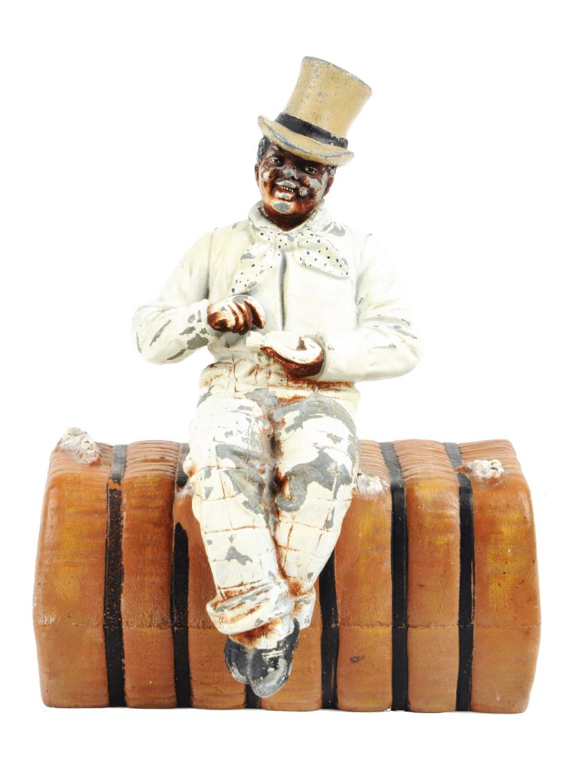 Cast Iron Man on Bale of Cotton Doorstop. (1 of 2)