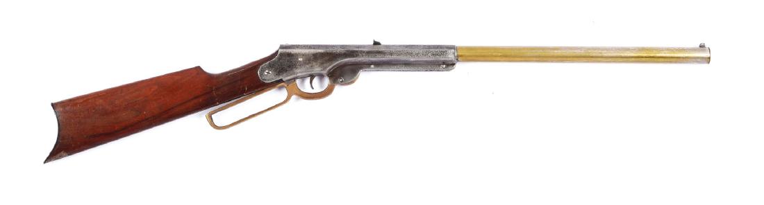 Daisy Bennett 1000 Shot Air Rifle.: BB/.175 caliber, 1000 shot, lever action, cast iron rear sight, steel buttplate. Mfg. 1903-09. Only 10% of original nickel finish remains. Almost all finish is gone from the brass barrel. Receiver is 