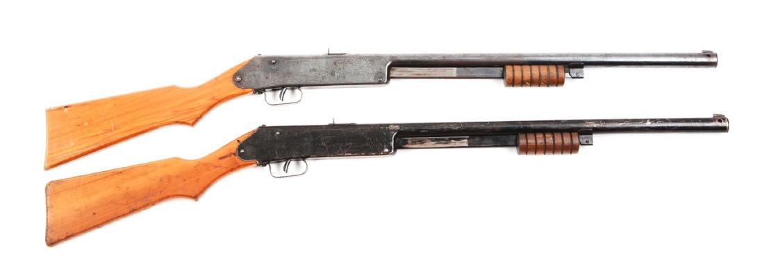 Lot Of 2: Model 107 Buck Jones Special.: (A) is missing the needle at rear of stock on sun dial. Compass is in full working order. No cracks in stock, just minor dents and scratches. Bluing is at 75%. Gun is complete. Stock screw has bolt on