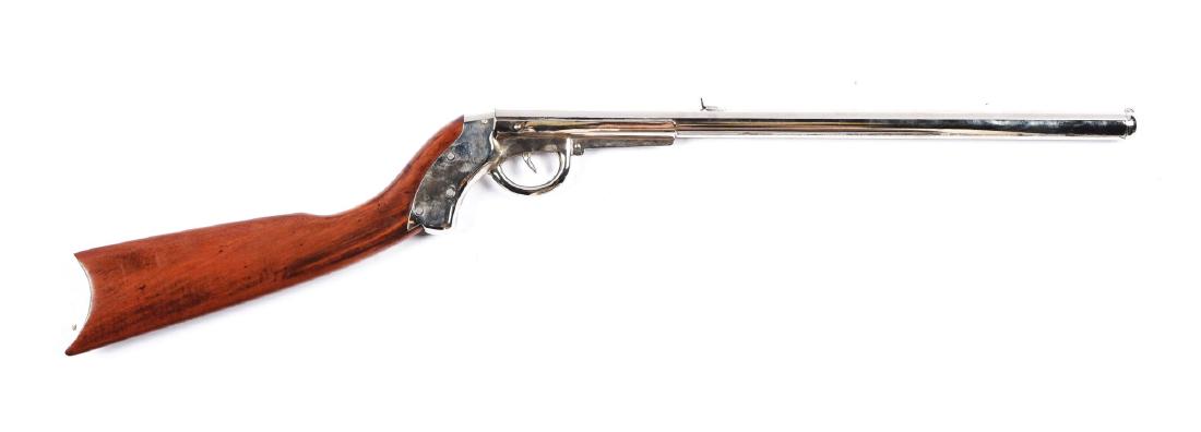 Markham-King 1905 Single Shot Air Rifle.: .180 large BB caliber. Friction barrel latch, muzzle cap with blade, Mfg. 1905. Top of receiver marked King with patent dates. Rear sight soldered on. May of been refinished with nickel and retains 10