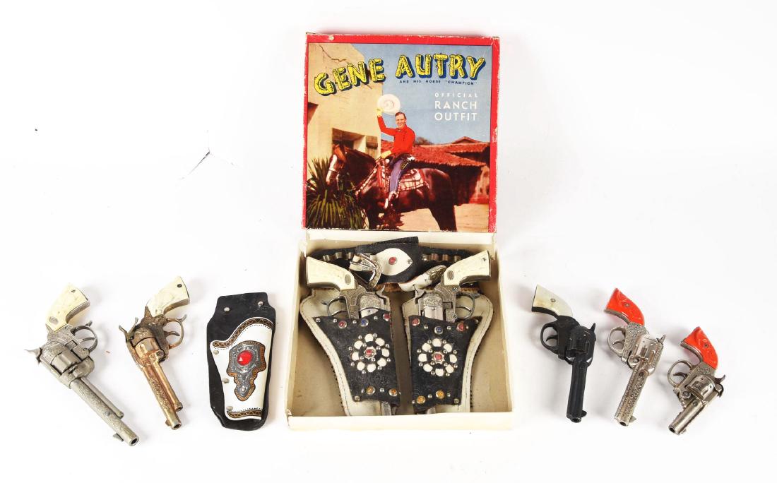 Lot of 7: Gene Autry Cap Guns. (1 of 1)