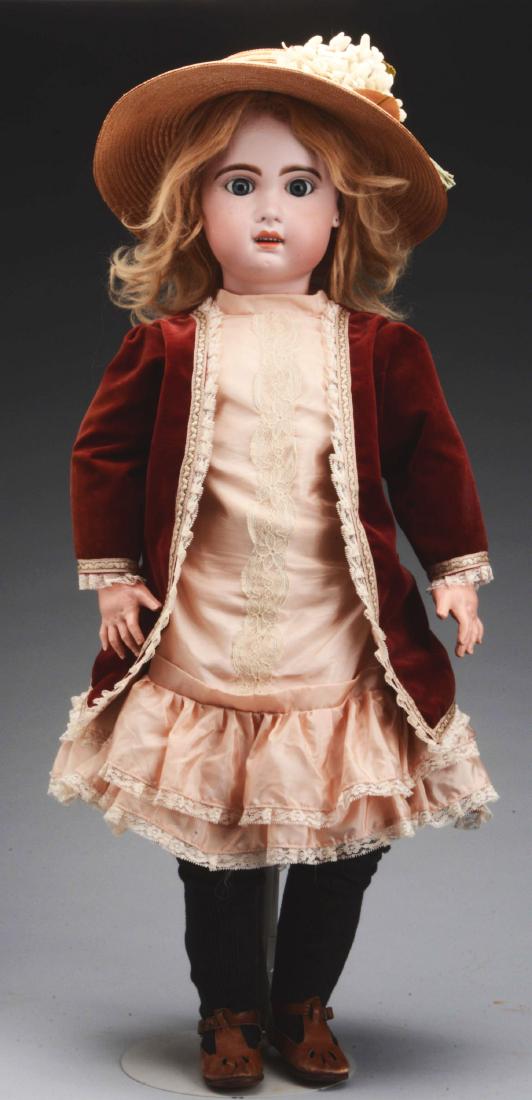 33” Open Mouth Jumeau Bebe.: Pretty doll with head incised at the neck “14”, having large blue grey paper weight eyes, open mouth with six square upper teeth, pierced ear lobes, all articulated French wood and composition bod
