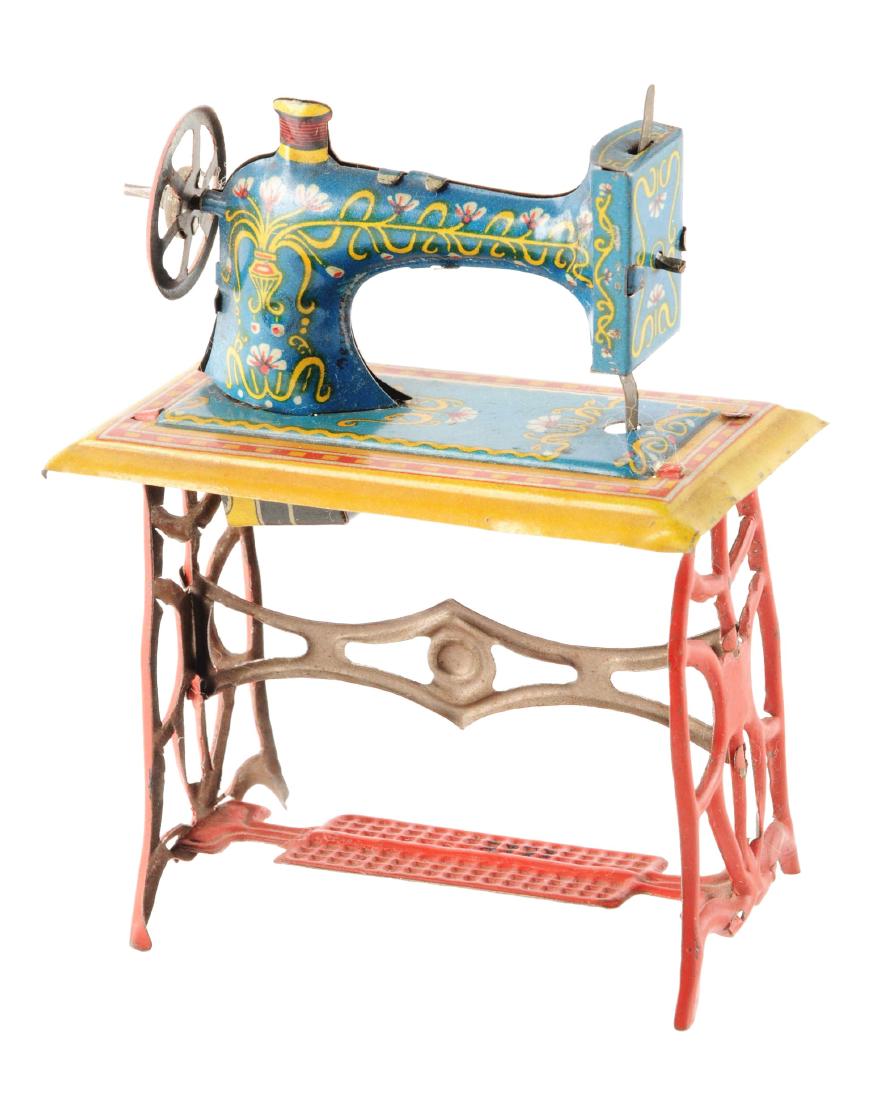 German Fischer Tin Litho Sewing Machine Penny Toy. (1 of 2)