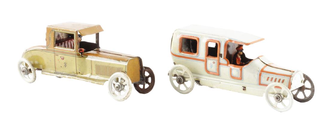 Lot of 2: German Tin Litho Wind Up Penny Size (1 of 2)