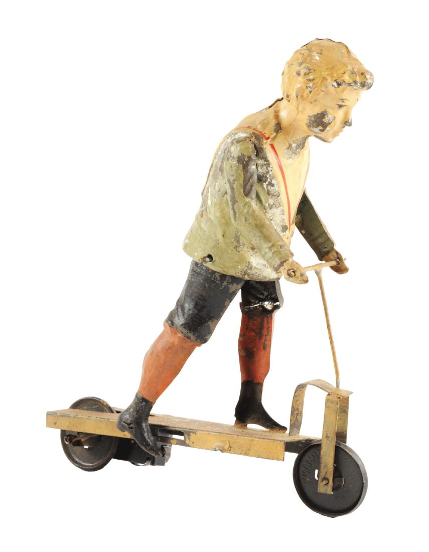 German Hand Painted Wind Up Boy Riding Scooter. (1 of 4)
