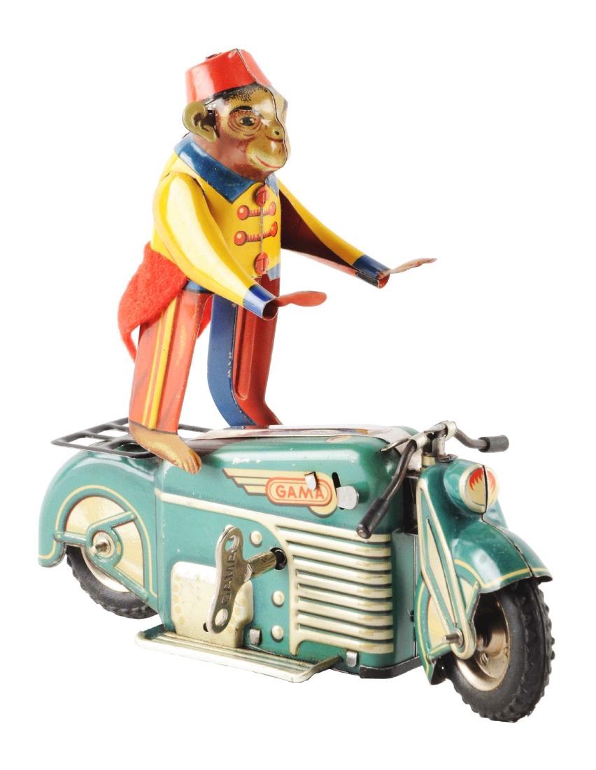 German Tin Litho Gama Motorcycle with Monkey. (1 of 2)