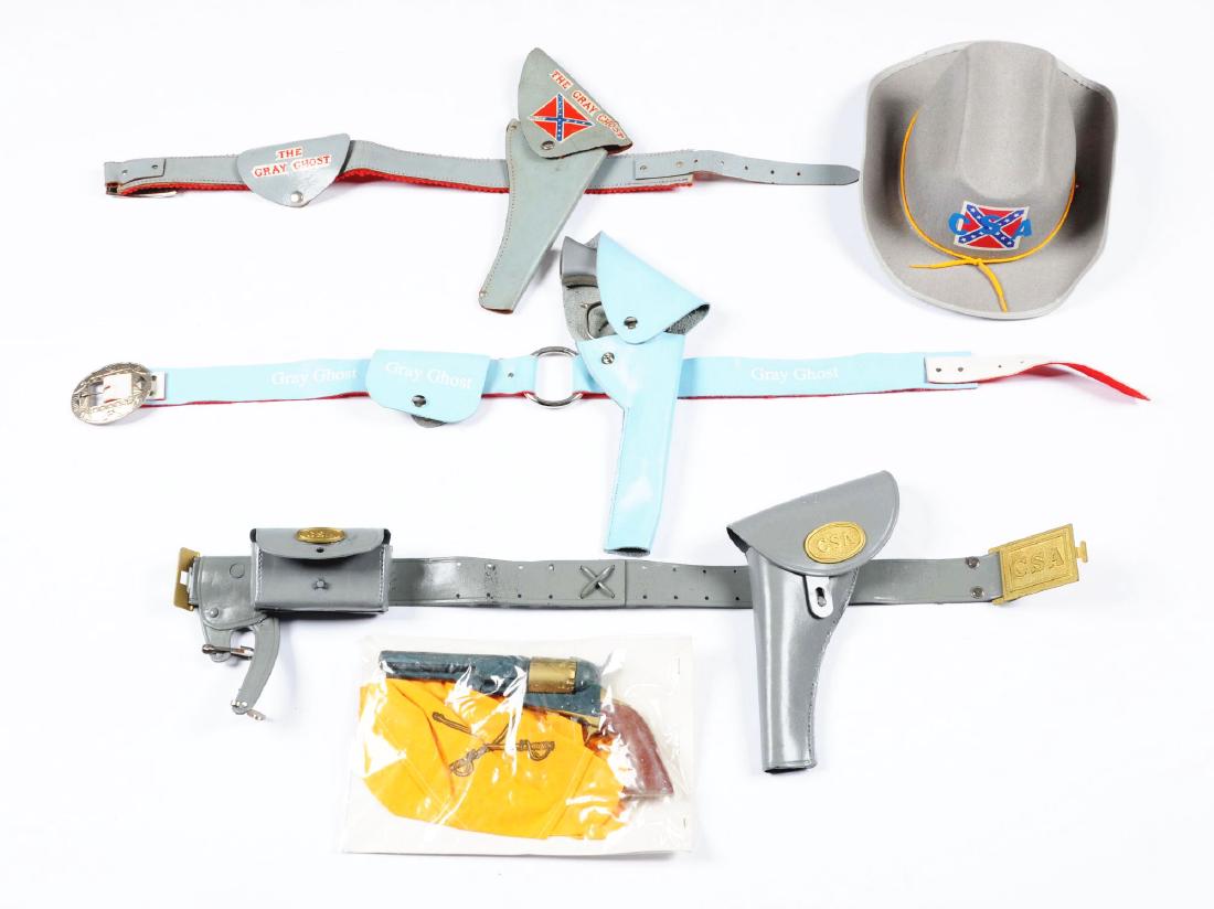 Lot of 4: Confederate & Colt Type Children's Play Guns.: Lot includes the scarce Grey Ghost confederate pistol with holster, belt and matching hat marked "CSA", another Grey Ghost set in light blue and a plastic holster and plastic gun marked "CSA" and a Co
