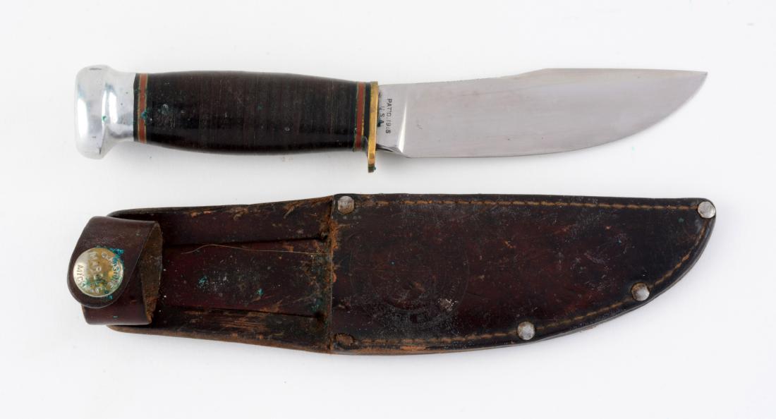 Marbles Gladstone Mich. USA "Woodcraft" Official Boy: Flat ground Skinner with thumb grooved back. Stacked leather handle with aluminum crown and brass single guard. Correct leather sheath embossed with official BSA stamp signed safety snap. No etching l