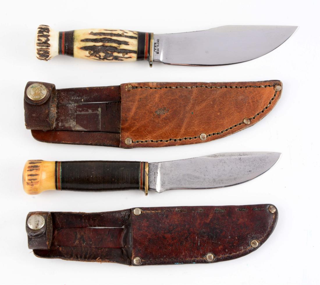 Lot of 2: Marbles Fixed Blade Knives.: Knife A) Woodcraft: Skinner blade with thumb grooved back. Beautiful split stag handle and stag crown with brass half guard. Correct leather sheath with signed safety snap. Circa pre 1943. Knife B) Sk