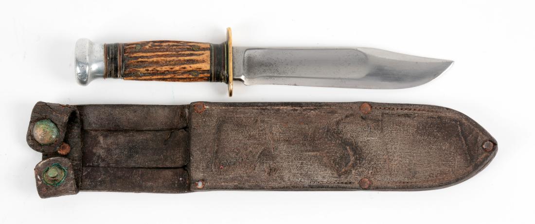 Marbles Gladstone Mich. USA "Ideal" Stag Handled Knife.: Fixed blade with fullers. Handled in stag with aluminum crown and full brass guard. Correct sheath. Circa post 1943.