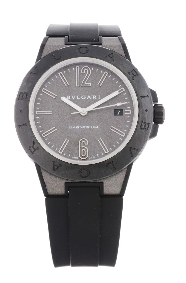 Bvlgari Magnesium and Peek Case with Ceramic Bezel: Bvlgari Magnesium and Peek Case with Ceramic Bezel Diagono Uni-sex Reference 102307 DG 41SMC Case Serial AH 06690. 41mm case diameter. Adjustable rubber strap. Bvlgari buckle. Winds, sets, runs, and d