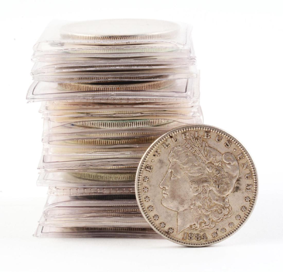 Lot of 20: Morgan Silver Dollars. (1 of 1)