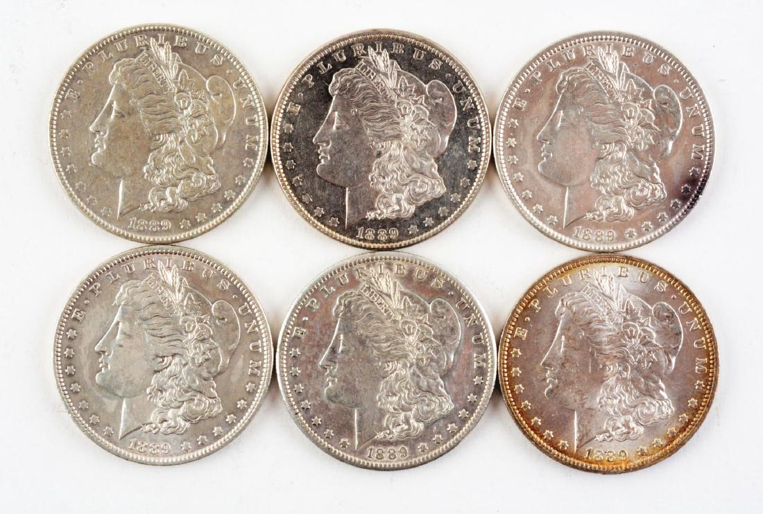 Lot of 6: Morgan Silver Dollars. (1 of 8)