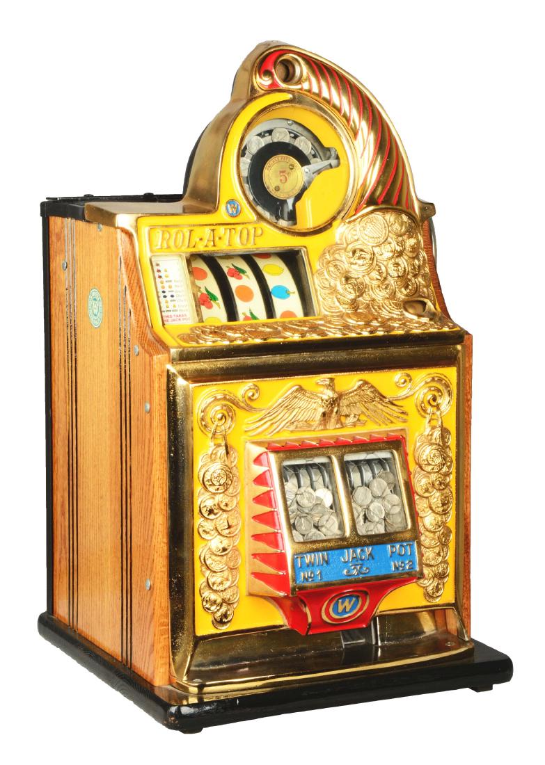 **Reproduction 5¢ Watling Rol-A-Top Twin Jackpot Slot: This slot machine, also called the Coin Front, is yellow in color and features an upturned cornucopia spilling coins over the top and front of the machine. Also featured on the front are the titular t