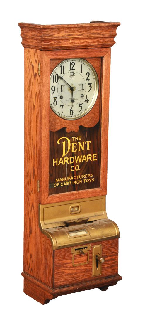 International Time Recording Co. Company Clock.: Wall-mount company time clock is housed in an oak cabinet with front glass advertising The Dent Hardware Co. To operate employees would insert their time card into the opening, slide the left lever to