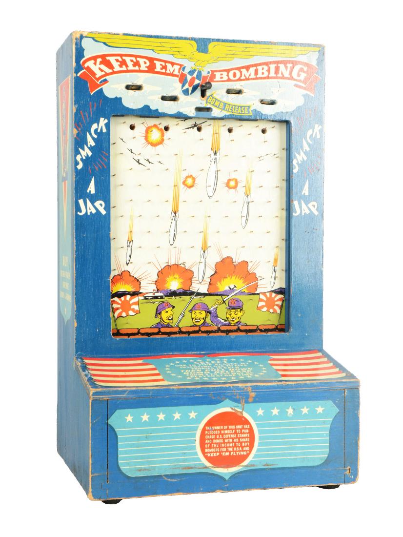 1¢ Keep Em Bombing Game.: Runyan Sales manufactured this countertop game in 1942, the early years of WWII. Also known as "Smack A Jap," the player is capable of loading 1 to 25 pennies at a time and dropping them with the Bomb