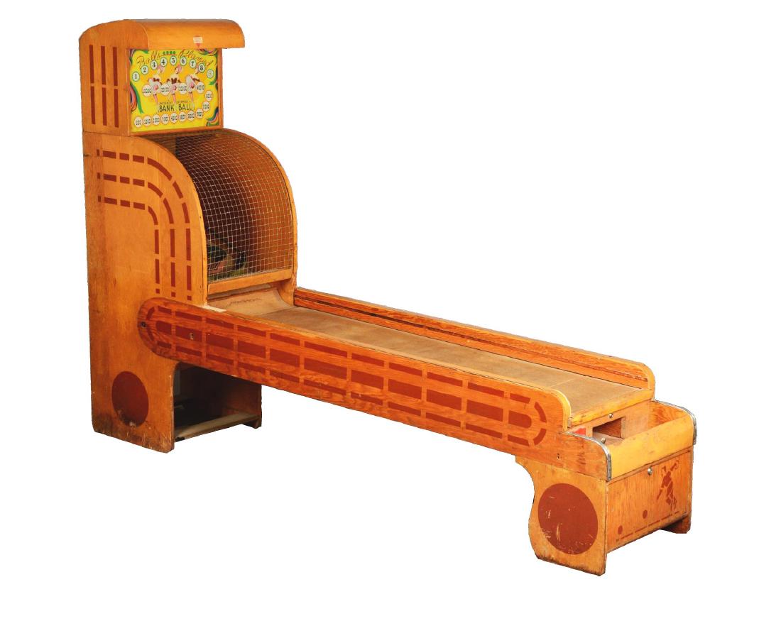 5¢ Amusement Enterprises Bank Ball Arcade Game.: This 9ft long Skee-Ball style game was manufactured by Amusement Enterprises Co. in 1946. Players roll the large wooden balls up the ramp and into one of the five slots. Points earned are tallied on t