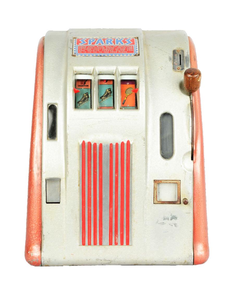 **1¢ Groetchen Tool Sparks Champion Trade Stimulator.: In fair condition with noticeable markings of paint chipping, however, the combination of silver and red gives this counter top trade stimulator an overall fun appearance. One cent earns a gum ball an
