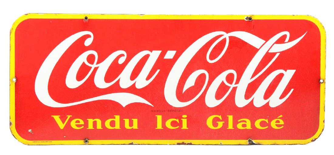 French Coca-Cola Porcelain Sign.: Single-sided porcelain enamel sign of red with white and yellow lettering and border. Reading "Coca-Cola/ Vendu Ici Glace". Some crazing can be seen throughout the surface and chipping of the enamel i