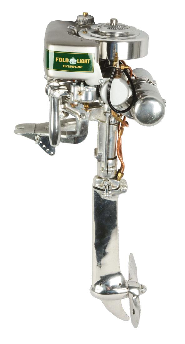 Evinrude Fold Light Outboard Boat Motor.: This is a restored, detachable boat motor with the propeller extending out 18" unfolded and features opposing twin cylinders. Serial number: 1001008. Invented in 1929, later manufactured in 1930. Cond