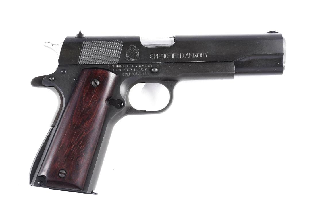 (M) Boxed Springfield Armory Model 1911-A1 Semi: This gun is in as new condition in the original box. Features a five inch barrel, matte finish and smooth wood grips. This is basically a Colt 1911-A1 clone. Accessories: BoxBarrel Length: 5"Caliber/B