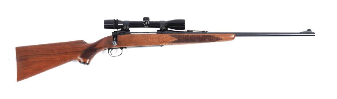 (M) Savage Model 110 Bolt Action Rifle.: Blue tapered barrel with strong lands and grooves. Factory ramp front sight, folding factory rear sight. Blued bolt action. Bolt is serial numbered to the gun. Four round internal box magazine. Blue a