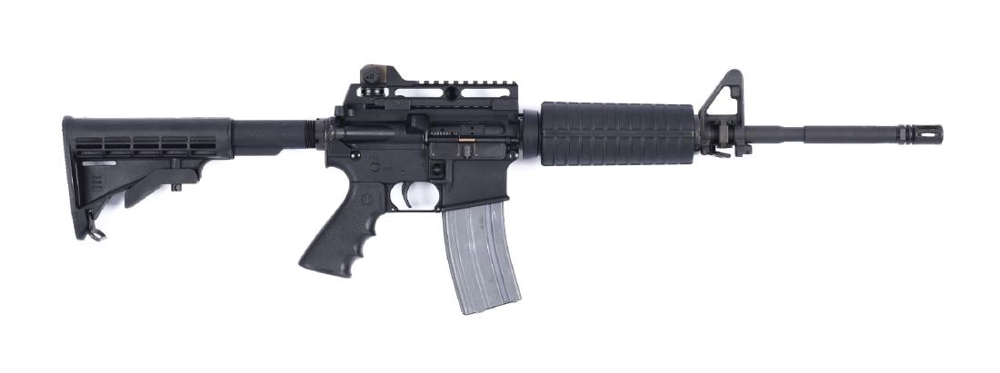 (M) Rock River Arms LAR-15 Semi-Automatic Carbine.: Round carbine barrel with 16" round site. Semi automatic flat top action with rail, dust cover and forward assist. Rock River arms rear sight with rail. Carbine type front hand guards and collapsible 
