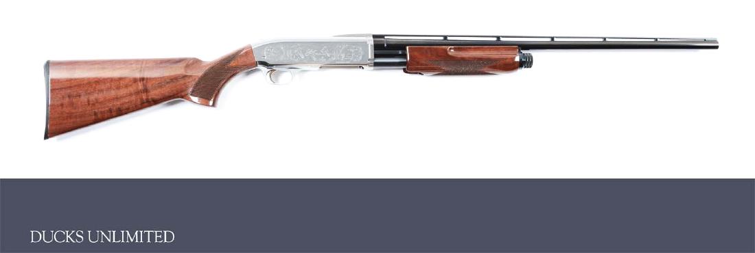 (M) Browning BPS Field Grade Ducks Unlimited 2002 Slide: Blued barrel with vented matte rib, single bead, and interchangeable choke tubes. Stainless steel action with stamp engraved duck scenes on both sides, as well as "DUCKS UNLIMITED" with logo. Figured 