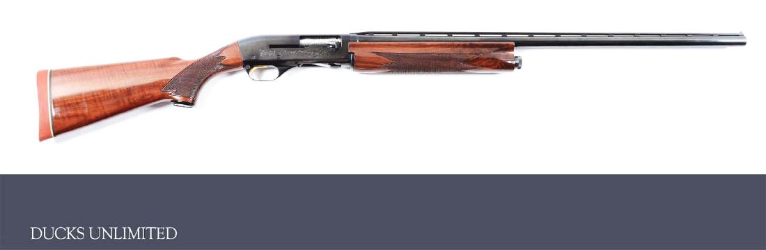 (M) Ithaca Model 51 Featherlight Ducks Unlimited 1978: Blued barrel with vented matte rib and twin beads, blued action with jeweled bolt and stamp-engraved ducks on both sides, left side with applied enameled Ducks Unlimited inlay. Figured varnished walnu