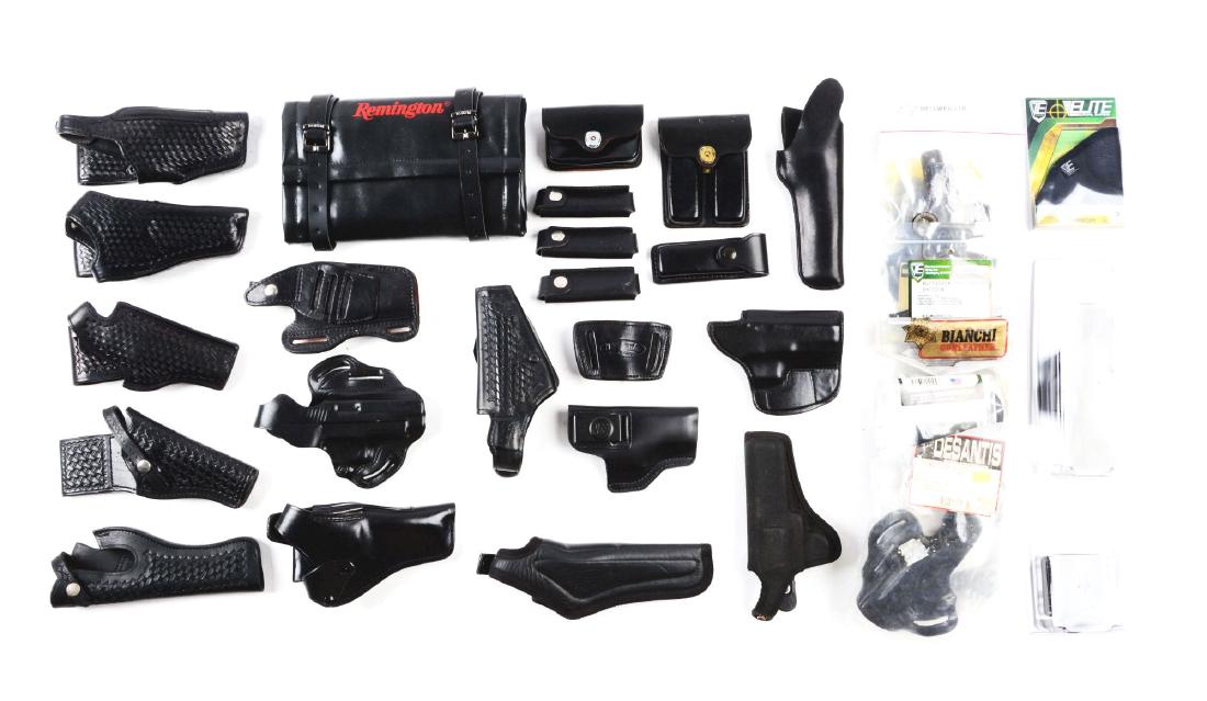 Large Lot of Leather and Canvas Holsters and Ammuntion: Large lot of maker marked holsters and magazine pouches consisting of the following makers: H. H. Heiser, Glock, Don Hume, Smith and Wesson, Bianchi, and Gould and Goodrich. These are all good quality