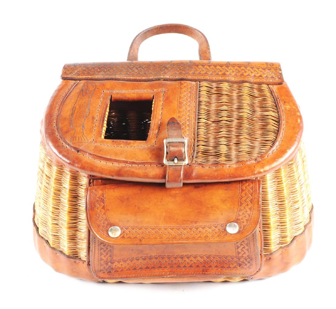 George Lawrence, Portland Oregon, #15 Tillamook Creel.: Leathered pocket model split willow 15â€ wide basket creel. The basket is clean and solid with a very nice patina and is leathered with cow hide and embossed with the standard square rope tooling w