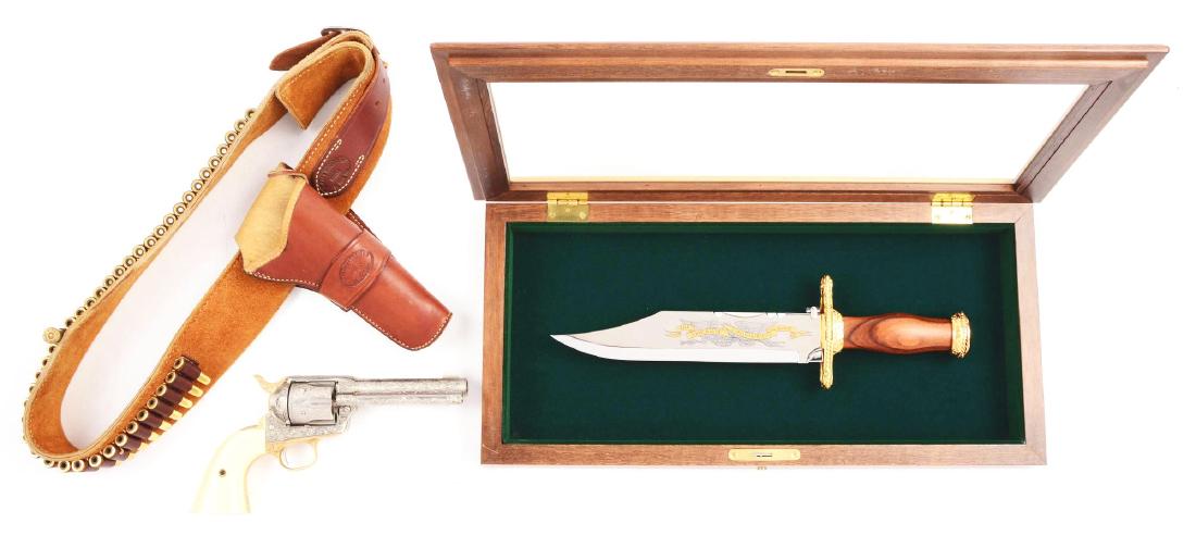 Franklin Mint John Wayne Commemorative Replica Colt: First in this lot is a Franklin Mint exact replica of a special revolver that was made by Colt for John Wayne. The frame is highly engraved and nickel plated with gold plated and engrave trigger guard
