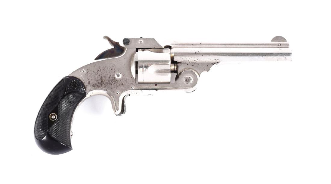 (A) S&W New Model 1-1/2 Spur Trigger Revolver.: Factory letter states that this revolver was shipped December 4th, 1893 to O.L. Petys with a 3-1/2" barrel and nickel finish. Standard features include five shot, single action, spur trigger, tip-up, 