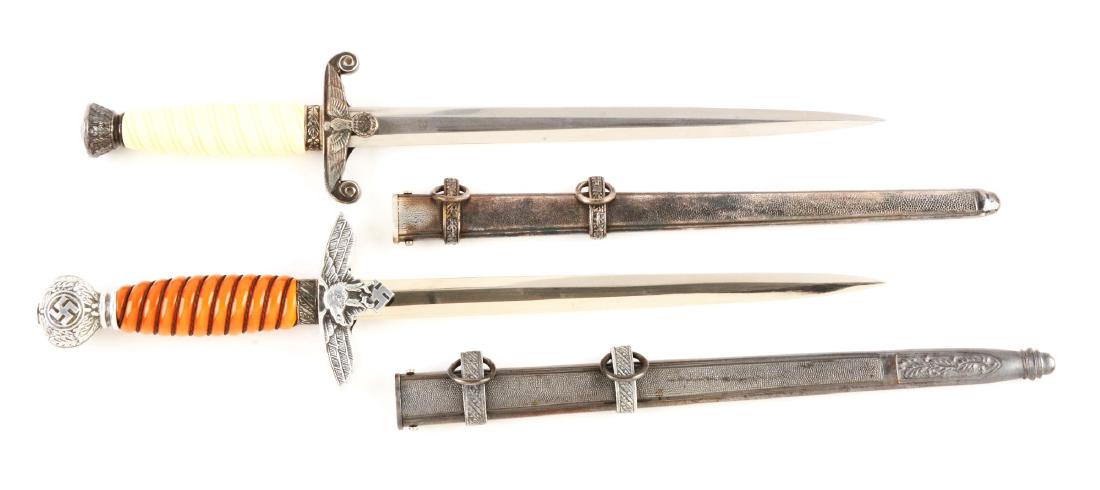Lot of 2: WWII German Luftwaffe and Heer Daggers.: Lot contains a very nice Luftwaffe 2nd Model dagger made by â€œPaul Weyersbergâ€ in untouched condition and a very nice Heer dagger made by â€œAlcosaâ€ in untouched condition. Both are v