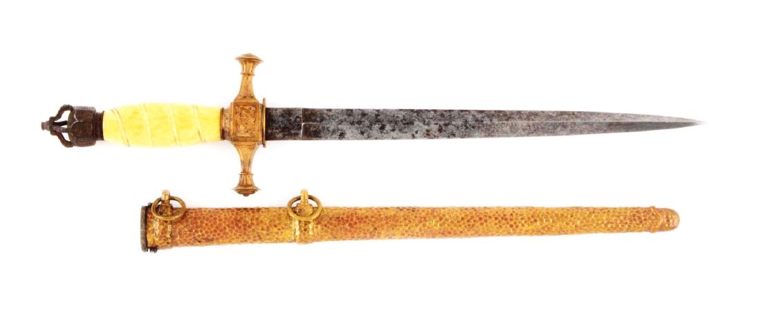 Very Rare 1848 Prussian Navy Dagger.: An extremely rare 1848 Prussian Navy dagger with engraved and hammered fittings and an open crown iron pommel. The onion-top pommel excahnged for a crown during service under the Kaiser. Scabbard tip 