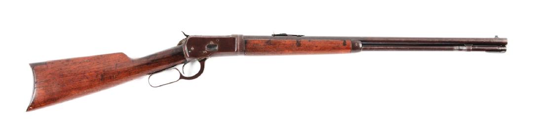 (C) Winchester Model 1892 Lever Action Rifle.: Manufactured 1927. Features include full round barrel, full magazine, takedown, blue finish, walnut stocks, rifle butt, sporting front and rear sights. Sights are non-Winchester replacements. Walnut s