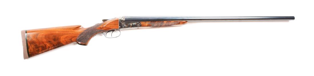 (C) A.H. Fox Sterlingworth 12 Bore SXS Shotgun.: Manufactured in 1910. All matching numbers. Features: full matte rib, twin beads, standard ejectors, blued finish, case colored box lock, double set triggers, and beautiful high grain walnut stock wit