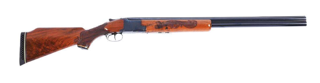 (C) Early Belgian Browning Superposed Shotgun.: Manufactured in Belgium in 1935 during the fifth year of production. Blued barrels with solid matte rib and single silver bead, standard Belgian Browning marks. Blued boxlock action marked "BROWNING/T
