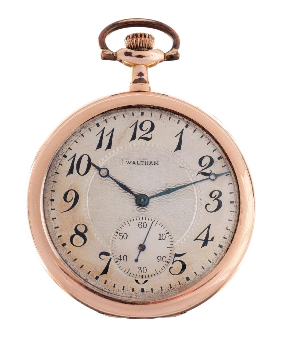 Waltham Yellow Gold Filled Colonial Pocket Watch With: 47mm case diameter. Case serial 2118. 17 jewel movement,signed "American Waltham Watch Company Mass." Movement serial 14122949. Textured perfect dial. Fine blue steel moon hands with fine blue steel s