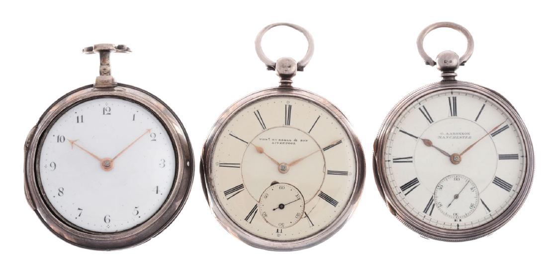 Lot of 3: Base Metal Pocket Watches.: The first one is a Thos. Russell + Sons Liverpool Silver Case Pocket Watch. Circa 1871. 45mm case diameter. Circa 1871. Damage to dial. The second is a G. Aaronson Manchester John Felltham Lever Escap