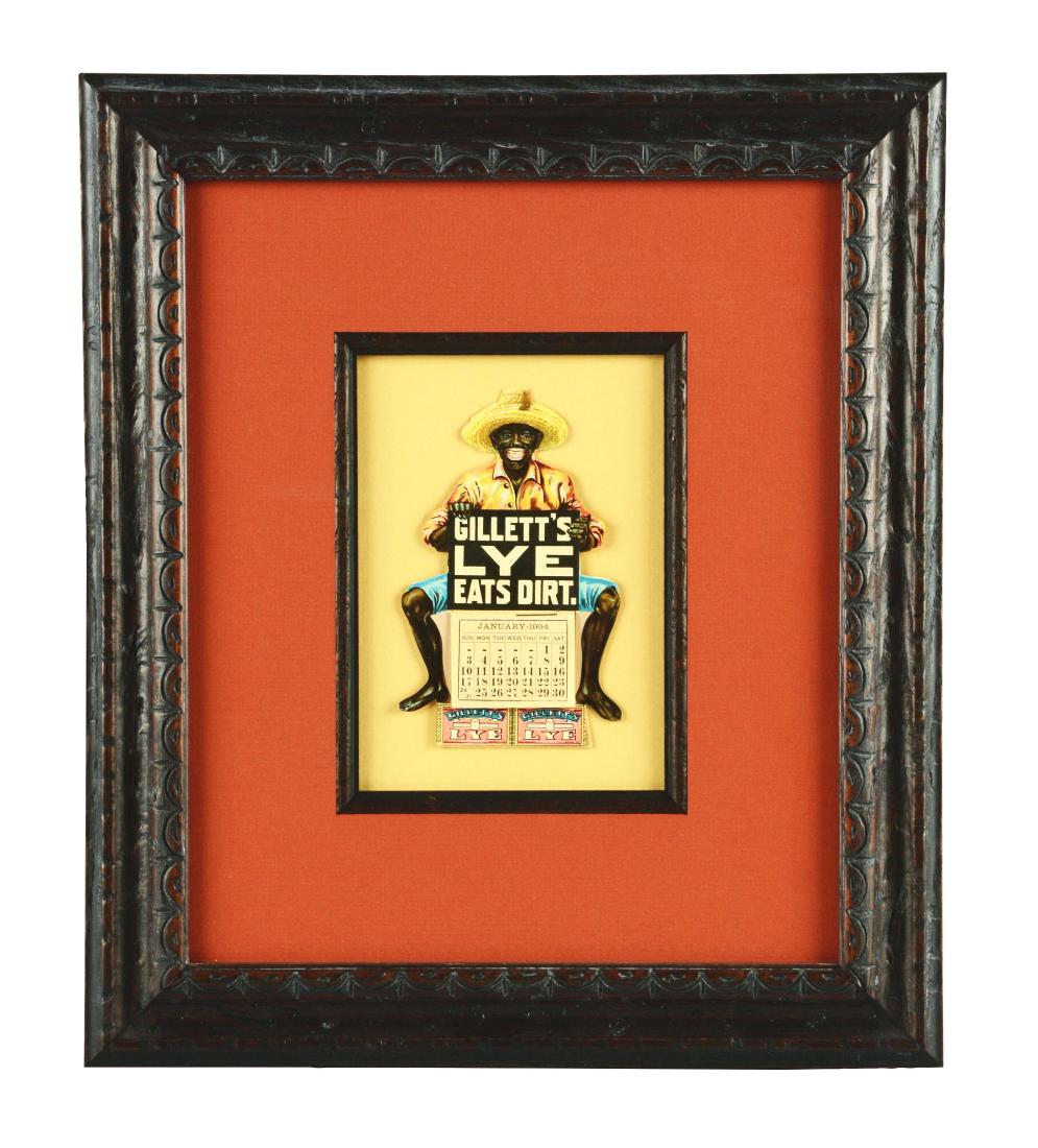 Gillett's Lye Diecut Advertising Calendar.: This piece is framed behind glass. It is dated 1904 and shows a diecut black man sitting down holding up a Gillett's Lye advertisement. It is in remarkable condition with no issues. Condition:(Near Mi