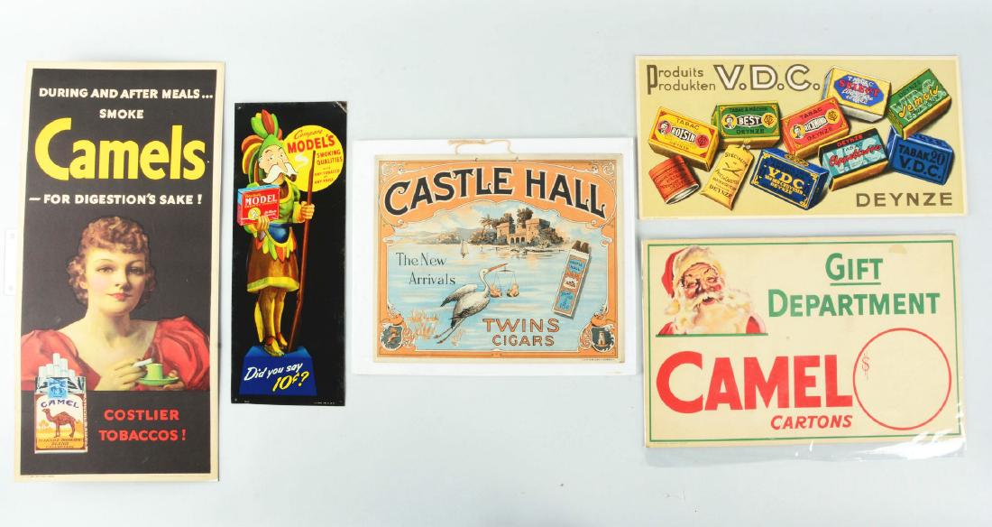 Lot Of 5: Tobacco Advertising Signs.: Lot includes signs from Camel, Model's, VDC, and Castle Hall as well as a Camel cigarette Santa Claus sign. Condition:(Very Good - Excellent).DimensionsLargest : 21" x 10".Condition:(Very Good - Excel