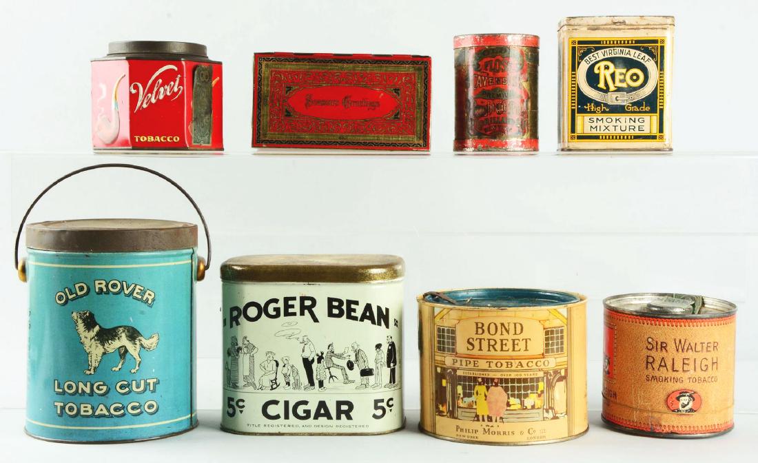 Lot Of 8: Tobacco Tins.: Lot includes tins from Rio, Velvet, Old Rover, Bondstreet, Rodger Bean, Floss, and Sir Walter Raleigh.Condition:(Good - Very Good).DimensionsLargest : 7" x 5 -1/2".Condition:(Good - Very Good).Dimensi