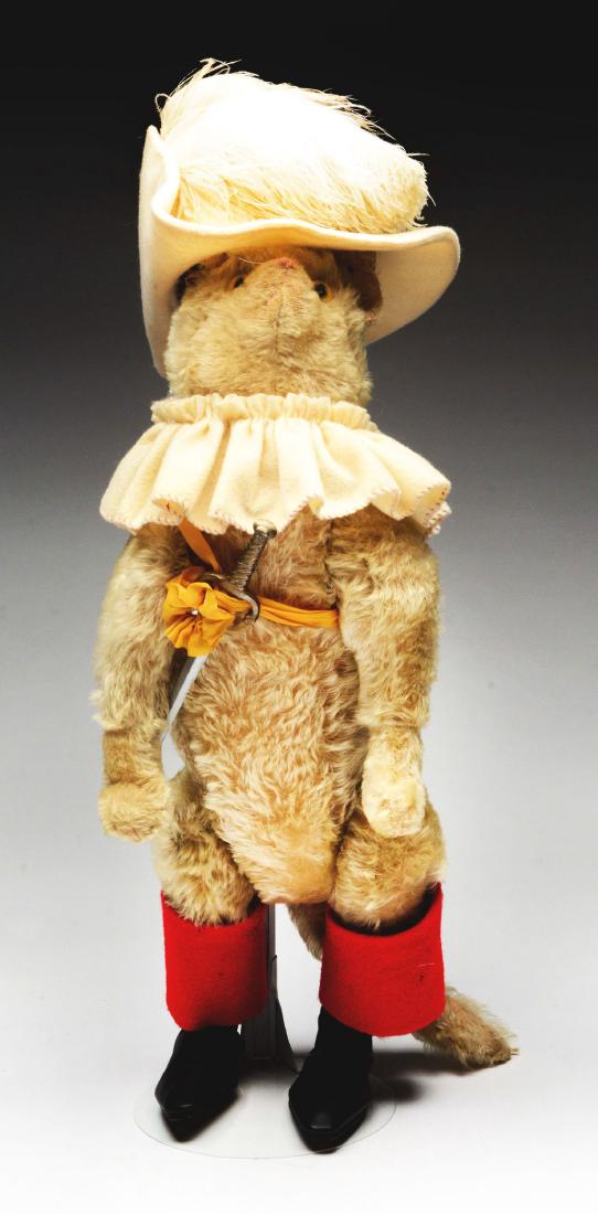 1912 Steiff Puss in Boots.: Conjuring up the spirit of the famous European fairy tale, Steiff's Puss in Boots was created in three sizes, this being the largest at 20". The jointed mohair puss was made only between 1912-1917. A