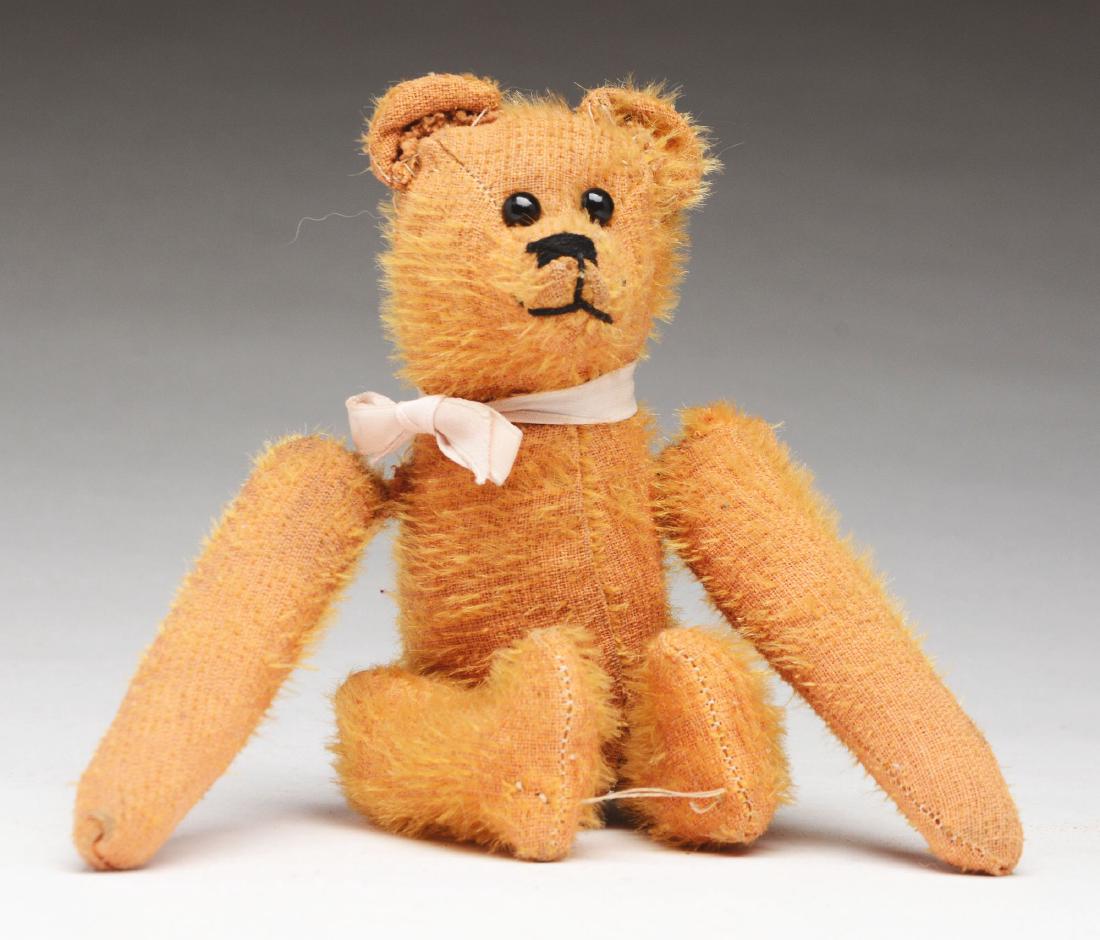 Gold Teddy Bear with Tumbling Action. (1 of 2)